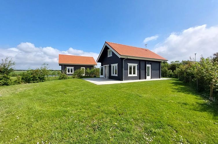 Vacation home in Burgh-Haamstede with sunny terrace and green garden in Schouwen-Duiveland, Zeeland.