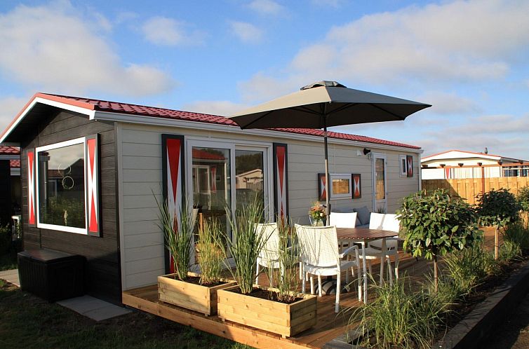 Enjoy the sun on the terrace of VZ824 Chalet in Veere, Serooskerke, Walcheren, Zeeland.