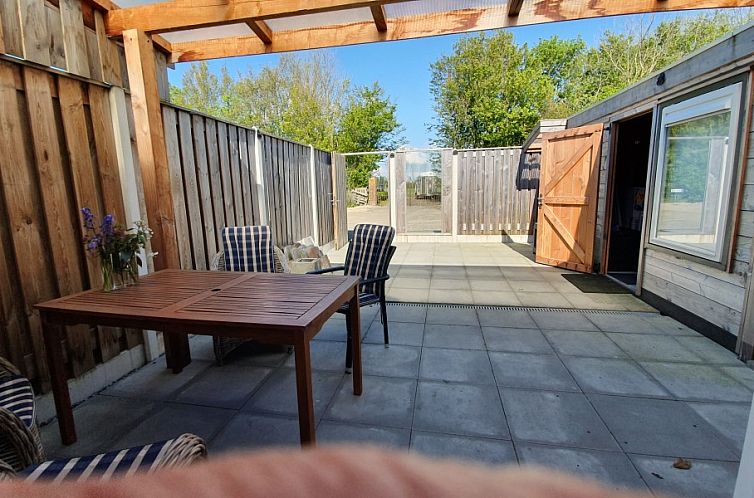 DE ZON IN STEE AAN ZEE, vlak bij Zee.