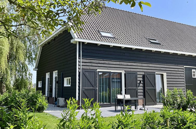 Ferienhaus ZE1456 in Wemeldinge mit sonniger Terrasse und gruenem Garten in Zuid-Beveland, Zeeland.