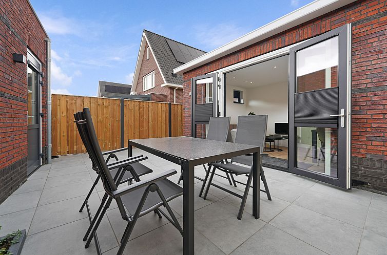 Enjoy the terrace at vacation home ZE1420 in Nieuwdorp, South Beveland, ideal for relaxation in Zeeland.