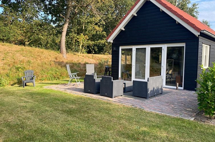 Enjoy the peace and quiet on the terrace of vacation home Vrijheid in Ouddorp, Goeree-Overflakkee, South Holland.