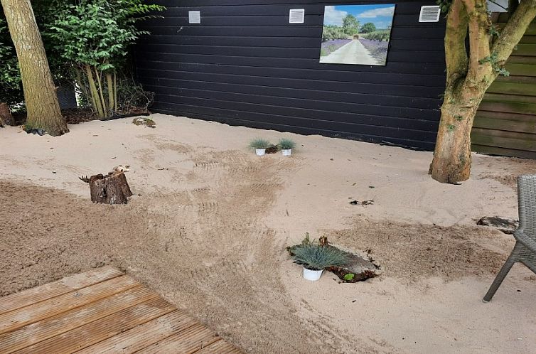 Chalet Sunrise met prive strandtuin