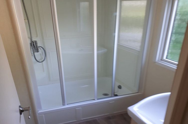 Chalet Sunrise met prive strandtuin