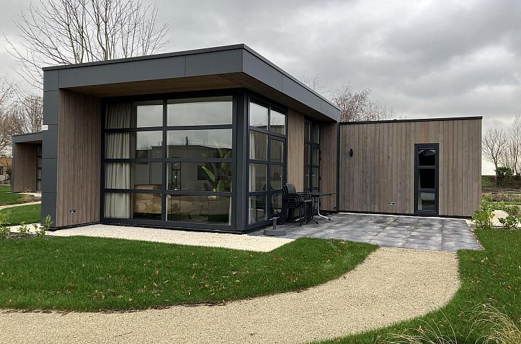 L-Cube 4 vacation home in Warmond, Green Heart, South Holland with modern architecture and spacious terrace in green surroundings.