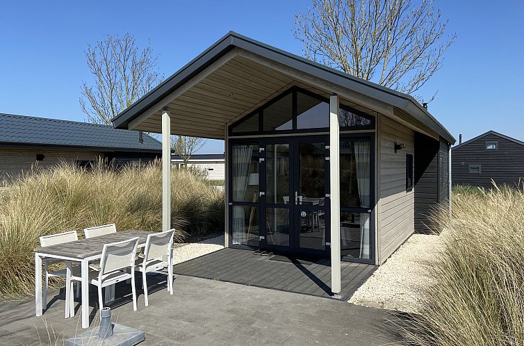 Enjoy the outdoors on the veranda of Chalet in Hellevoetsluis, located in beautiful Voorne Putten, South Holland.