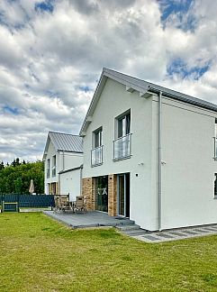Appartement Appartement Gemütliches Ferienhaus mit Garten und Seeblick, Kolczewo, Pologne Nord, Pologne