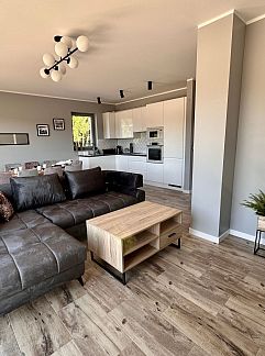 Appartement Appartement Gemütliches Ferienhaus mit Garten und Seeblick, Kolczewo, Pologne Nord, Pologne