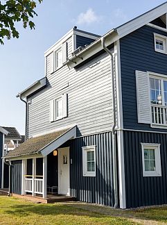 Bungalow H- zeezicht Leuchtturm, Sierksdorf, Sleeswijk-Holstein, Duitsland