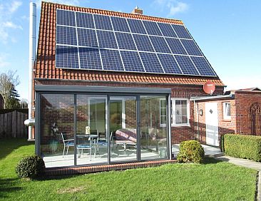 Vakantiehuis mit Wintergarten und Garten am Deich