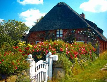 Appartement Wohnung in einem reetgedeckten Friesenhaus aus d