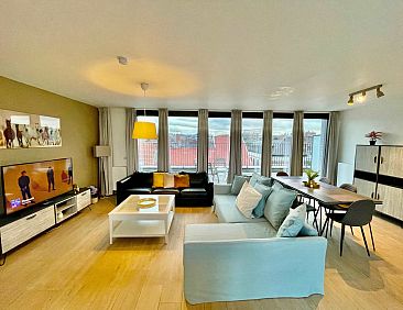 Modern 2BR Penthouse Near Diamond District by OneLuxStay