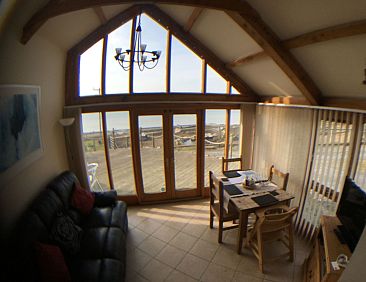 Vakantiehuis Ferien Scheune mit Blick auf das Meer und den S