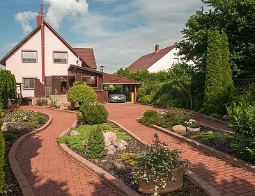 Vakantiehuis Wohnung mit Garten, Grill und Gemeinschaftspool