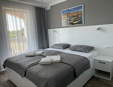 Appartement in Fažana mit Terrasse und Garten