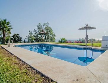 Appartement "Huelva" mit Gemeinschaftspool in einem andalusi