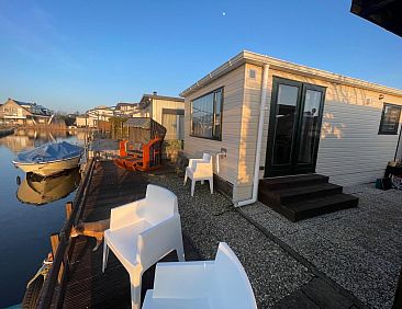 Appartement Chalet Welcome direkt am Wasser mit eigenem Stei